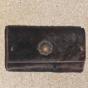 Brown Cow Hide Clutch with Decorative Medallion